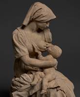 French peasant woman nursing a baby