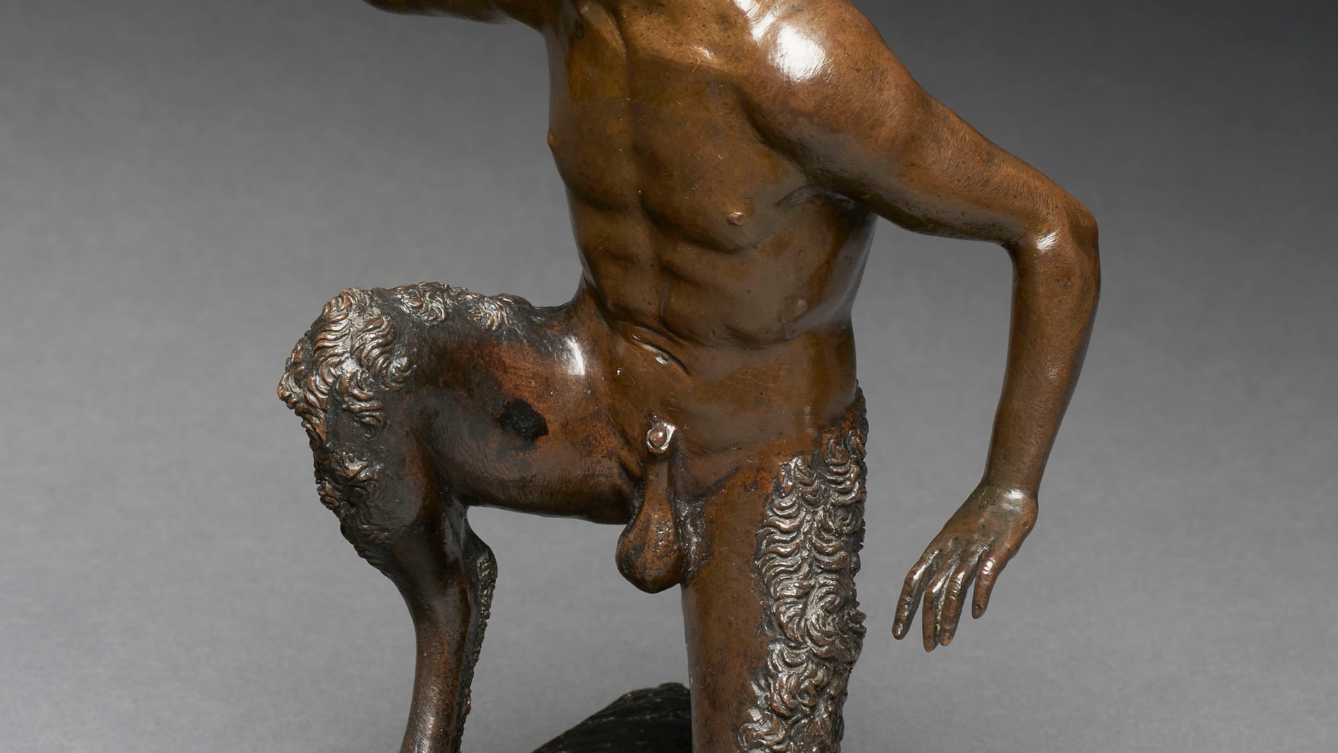Kneeling satyr