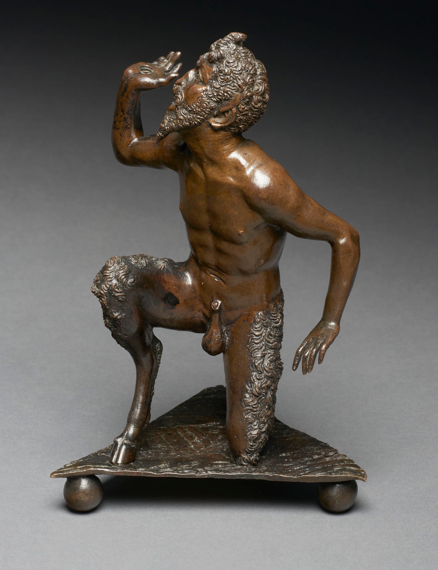 Kneeling satyr