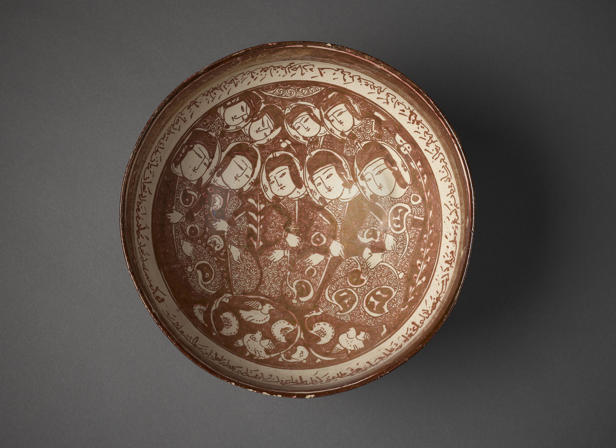 Bowl with nine figures